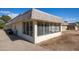 Exterior view of the enclosed patio area with screens at 9813 W Sandstone Dr, Sun City, AZ 85351