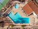 Aerial shot showcasing a modern pool area with a hot tub and ample seating for residents at 11036 N 28Th Dr # 210, Phoenix, AZ 85029