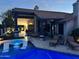 Stunning backyard with a luxurious pool, hot tub, and covered patio featuring ample seating and a cozy fire pit at 11945 N 83Rd Pl, Scottsdale, AZ 85260