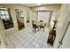 Cozy breakfast nook features tile floors, lots of light, and breakfast seating for four at 12702 W Ashwood Dr, Sun City West, AZ 85375