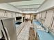 Functional kitchen with ample white cabinets, blue countertops, and stainless steel appliances at 12702 W Ashwood Dr, Sun City West, AZ 85375