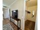 Walk-in closet with an open doorway to the bedroom, and a view to the bathroom at 12702 W Ashwood Dr, Sun City West, AZ 85375