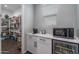 Well-organized pantry features ample shelving, maximizing storage and convenience in the kitchen area at 12702 W Sierra Vista Dr, Glendale, AZ 85307