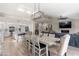 Bright dining area offering an open view to the updated kitchen and living room at 1501 N Lesueur --, Mesa, AZ 85203