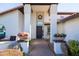 Inviting front entrance with desert landscaping and a decorative front door at 1501 N Lesueur --, Mesa, AZ 85203
