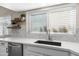 Kitchen area with lots of light, stainless steel appliances, and light countertops at 1501 N Lesueur --, Mesa, AZ 85203