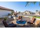 Charming outdoor patio with a fire pit and comfortable seating at 1501 N Lesueur --, Mesa, AZ 85203