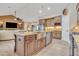 Spacious kitchen island with stainless steel appliances and wooden cabinetry at 156 E Frontier St, Apache Junction, AZ 85119