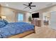 Serene main bedroom with ample natural light and a ceiling fan at 156 E Frontier St, Apache Junction, AZ 85119