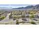 Expansive aerial view showcasing a beautiful desert community set against a backdrop of majestic mountains at 15853 S 17Th Dr, Phoenix, AZ 85045