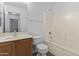 This bathroom features a single-sink vanity and a shower-over-tub at 15853 S 17Th Dr, Phoenix, AZ 85045