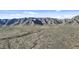 Panoramic aerial shot featuring a rugged desert landscape with towering mountains and native vegetation at 15853 S 17Th Dr, Phoenix, AZ 85045