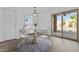 Bright dining room with patio access and a view of the pool at 15853 S 17Th Dr, Phoenix, AZ 85045