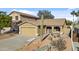 Charming single-story home featuring a two-car garage and low-maintenance desert landscaping at 15853 S 17Th Dr, Phoenix, AZ 85045