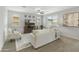 Living room offers modern decor, wood-style flooring, and an entertainment center at 17176 W Molly Ln, Surprise, AZ 85387