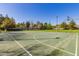 Well-maintained basketball court with manicured lawns providing ample space for outdoor activities and sports at 1756 E Bridgeport Pkwy, Gilbert, AZ 85295