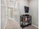 A light and airy hallway that includes a book shelf and neutral color palette at 1756 E Bridgeport Pkwy, Gilbert, AZ 85295