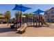 View of a community playground with sun shades at 1756 E Bridgeport Pkwy, Gilbert, AZ 85295