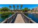 Scenic view of a pond with fountain, community pool and gazebo at 1756 E Bridgeport Pkwy, Gilbert, AZ 85295