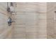Detailed shower boasts modern tile, adjustable showerhead, and a convenient soap dish at 1756 E Bridgeport Pkwy, Gilbert, AZ 85295