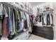 Spacious walk-in closet with shelving, drawers, hanging rods and a place for storing shoes at 1756 E Bridgeport Pkwy, Gilbert, AZ 85295