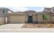 Charming single-story home with desert landscaping, tile roof, and a spacious two-car garage at 17637 W Rancho Dr, Litchfield Park, AZ 85340