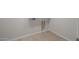 Dedicated laundry area with tile flooring, hookups, and ample space for appliances at 17637 W Rancho Dr, Litchfield Park, AZ 85340