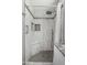 Modern shower with a built-in seat, niche, and multiple shower heads at 1951 N 64Th St # 69, Mesa, AZ 85205