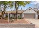 Charming single-story home featuring desert landscaping, a two-car garage, and inviting curb appeal at 19601 N 14Th St, Phoenix, AZ 85024