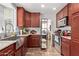 Kitchen with stainless steel appliances, modern cabinets, and stylish countertops at 19601 N 14Th St, Phoenix, AZ 85024