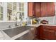 Modern kitchen sink with a stainless steel faucet and fixtures at 19601 N 14Th St, Phoenix, AZ 85024