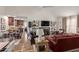 Spacious living room with a fireplace and open access to the kitchen and dining areas at 19601 N 14Th St, Phoenix, AZ 85024