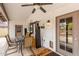 Covered patio with a ceiling fan, outdoor furniture, and convenient access to the backyard at 19601 N 14Th St, Phoenix, AZ 85024