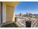 Balcony features city views and greenery at 207 W Clarendon Ave # G18, Phoenix, AZ 85013