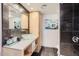 Contemporary bathroom features modern fixtures, vanity, and decorative tile at 207 W Clarendon Ave # G18, Phoenix, AZ 85013
