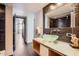 Modern bathroom features a stylish vanity, and a shower with decorative tile at 207 W Clarendon Ave # G18, Phoenix, AZ 85013