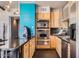 Well-appointed kitchen featuring stainless steel appliances, granite counters and modern cabinetry at 207 W Clarendon Ave # G18, Phoenix, AZ 85013