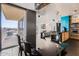 Spacious living room featuring modern decor, a fireplace, and large windows with expansive city views at 207 W Clarendon Ave # G18, Phoenix, AZ 85013
