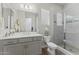 Clean bathroom features a glass shower, toilet, and spacious vanity at 20718 W Colter St, Buckeye, AZ 85396