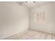 This bedroom has a window with shutters and wood-look flooring at 2164 W Megan St, Chandler, AZ 85224