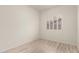Well lit bedroom featuring hard surface floors and plantation shutters at 2164 W Megan St, Chandler, AZ 85224