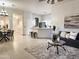 Open floor plan connecting the living room, dining area, and modern kitchen at 2164 W Megan St, Chandler, AZ 85224