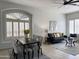 Open living space with modern decor, plantation shutters, and neutral color palette at 2164 W Megan St, Chandler, AZ 85224