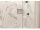 This shower has marble walls, a mosaic inlay, and bronze shower head at 2164 W Megan St, Chandler, AZ 85224
