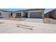 Attractive one-story home with a two-car garage, low-maintenance landscaping, and a neutral color scheme at 22685 E Saddle Way, Queen Creek, AZ 85142