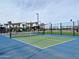 Community pickleball court with green and blue surface surrounded by fencing at 22685 E Saddle Way, Queen Creek, AZ 85142