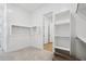 Spacious walk-in closet features open shelving and provides access to the bedroom at 22685 E Saddle Way, Queen Creek, AZ 85142