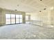 Unfinished large living space with a sliding glass door opening onto the patio area at 22693 E Saddle Way, Queen Creek, AZ 85142