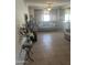 Inviting living room features tile flooring, natural light, and comfortable seating at 2530 W Berridge Ln # E201, Phoenix, AZ 85017