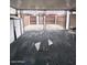 Enclosed back patio area with concrete flooring and a fence offering privacy and space for outdoor furniture at 2551 W Berridge Ln # D6, Phoenix, AZ 85017